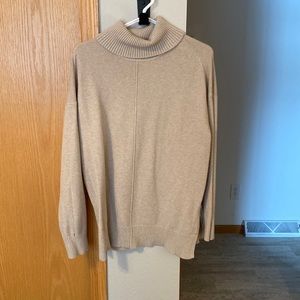 Womens tan turtle neck sweater